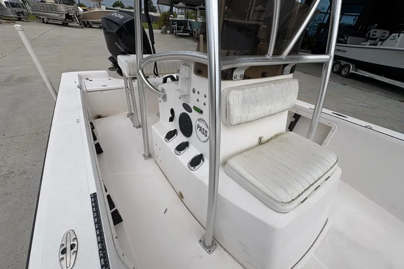 Slide: The Image of 2000 Kenner 21 VISION boat interior with seating and control panel. - 15