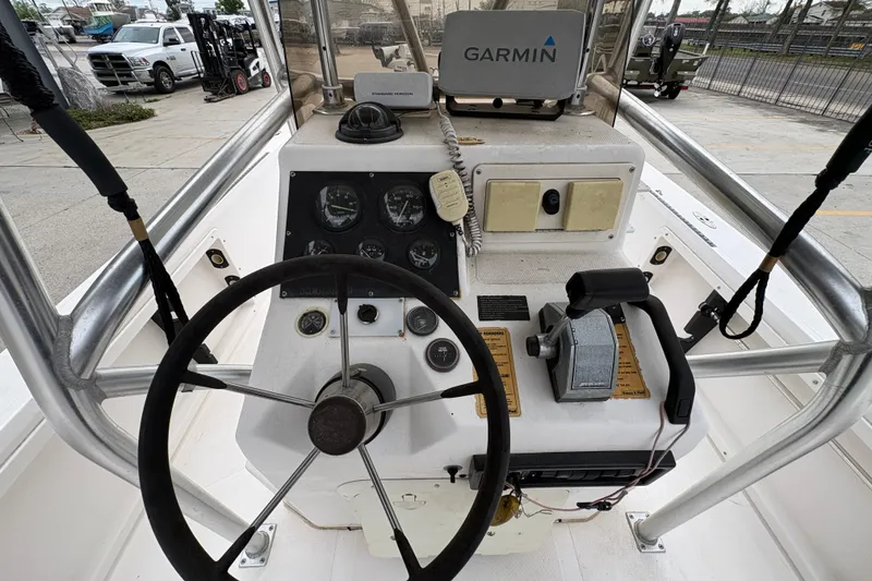 Slide: The Image of Cockpit of a 2000 Kenner 21 VISION boat with Garmin navigation system. - 17