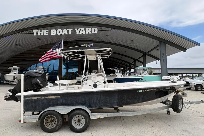 Slide: The Image of Kenner 21 VISION boat from 2000 on trailer at The Boat Yard dealership. - 3