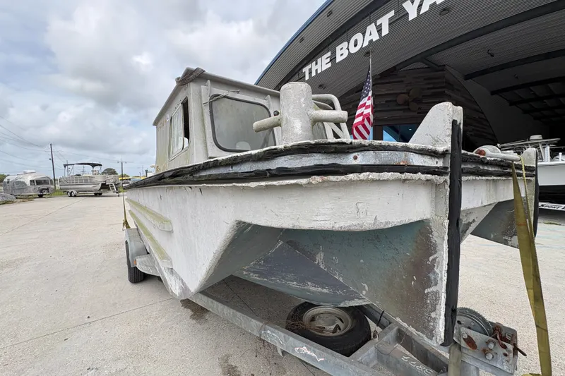 Slide: The Image of Vintage 1972 custom 23' work/push boat on trailer at boat yard. - 10