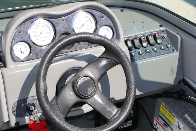 Slide: The Image of 2008 Alumacraft Dominator 165 Sport boat on trailer at Nichols Marine. - 15