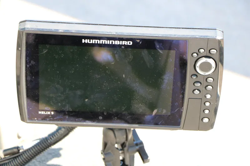 Slide: The Image of Humminbird Helix 9 fish finder on 2008 Alumacraft Dominator 165 Sport boat. - 16