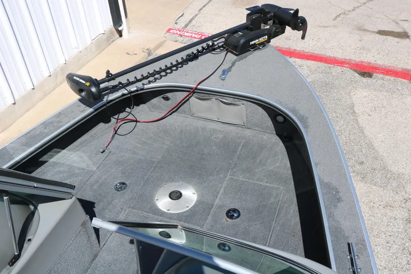 Slide: The Image of 2008 Alumacraft Dominator 165 Sport boat deck with Minn Kota trolling motor. - 17