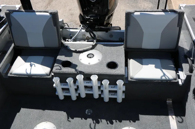 Slide: The Image of 2008 Alumacraft Dominator 165 Sport boat interior with seating and rod holders. - 19