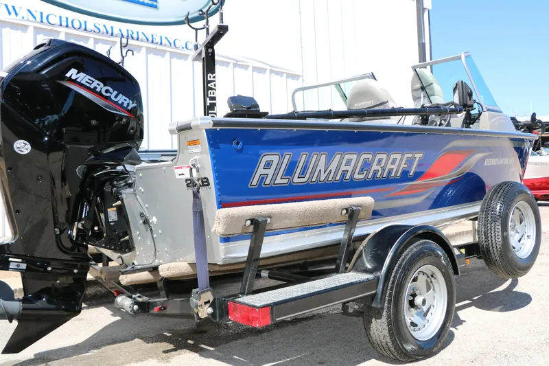 Slide: The Image of 2008 Alumacraft Dominator 165 Sport boat with Mercury engine on trailer. - 6