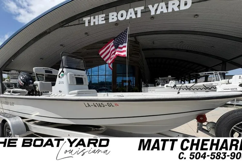 The Image of 2020 Blazer Bay 2170 boat displayed at The Boat Yard, Louisiana, with American flag. - 1