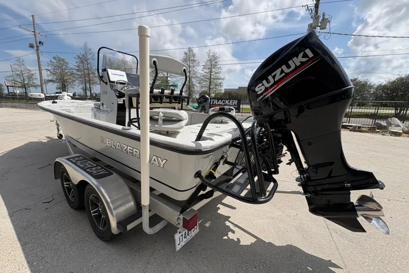 Slide: The Image of 2020 Blazer Bay 2170 boat with Suzuki outboard motor on trailer. - 6