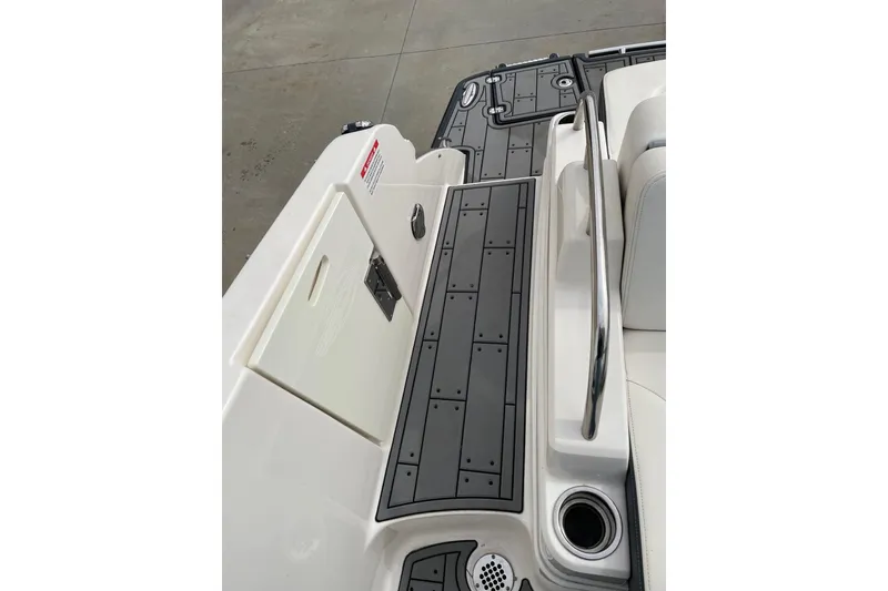 Slide: The Image of 2019 Chaparral 297 SSX boat deck with sleek design and modern features. - 18