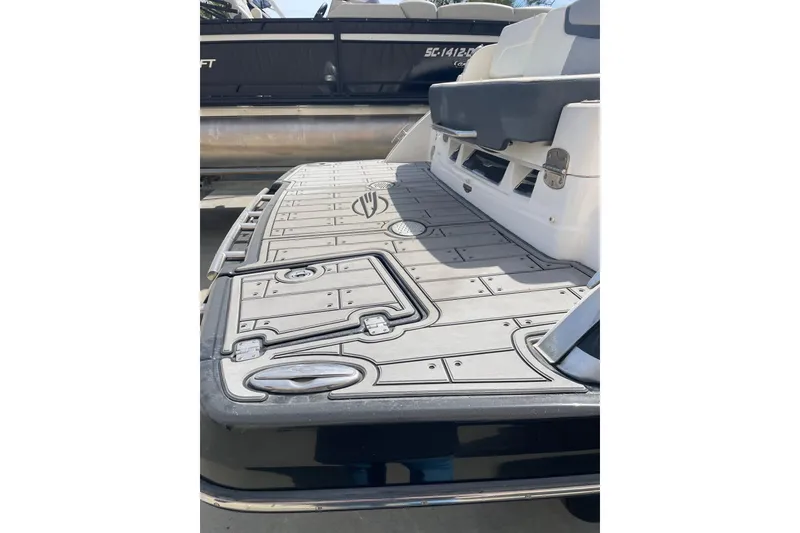 Slide: The Image of 2019 Chaparral 297 SSX boat deck with sleek design and modern features. - 21