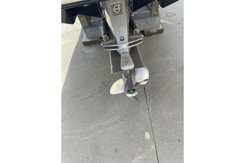 Slide: The Image of 2019 Chaparral 297 SSX boat propeller on concrete surface. - 22