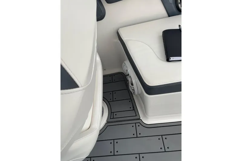Slide: The Image of 2019 Chaparral 297 SSX interior seating with sleek design and modern flooring. - 31