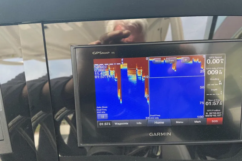 Slide: The Image of Garmin GPS display on 2019 Chaparral 297 SSX boat showing sonar and navigation data. - 46