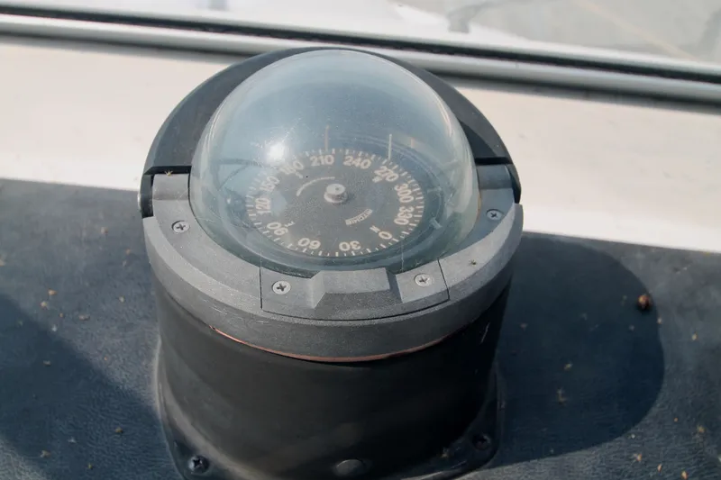 Slide: The Image of Compass on a 1996 Carver 330 Mariner boat. - 22