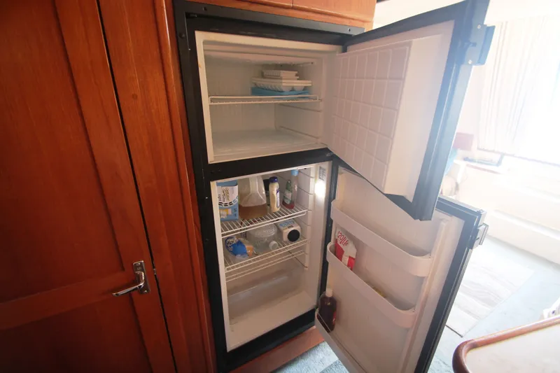 Slide: The Image of Open refrigerator in a 1996 Carver 330 Mariner yacht. - 37