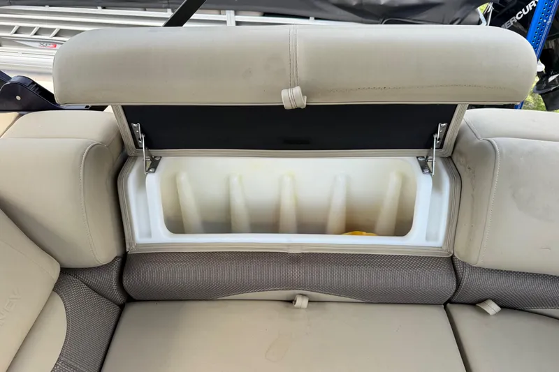 Slide: The Image of Open storage compartment in 2023 Regency 230 DL3 boat seat. - 20
