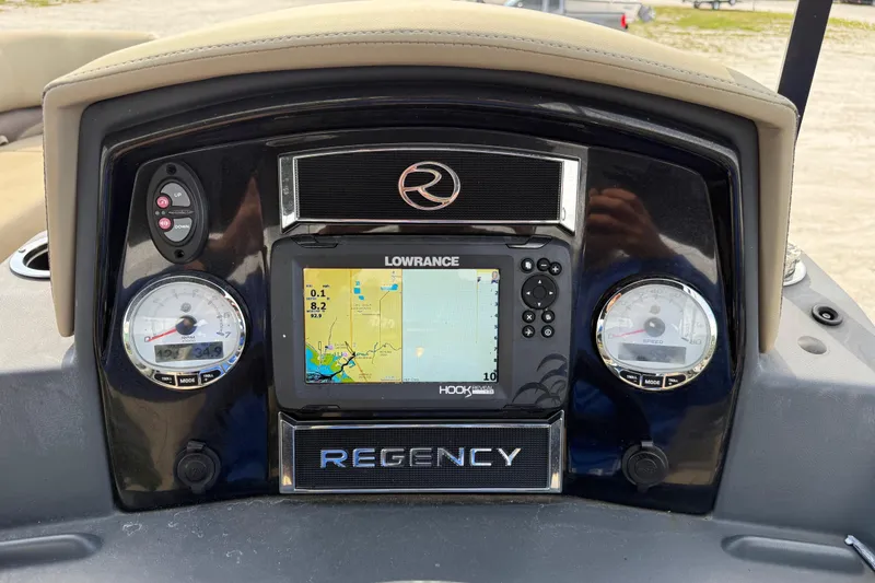 Slide: The Image of Dashboard of 2023 Regency 230 DL3 boat with Lowrance navigation system. - 34