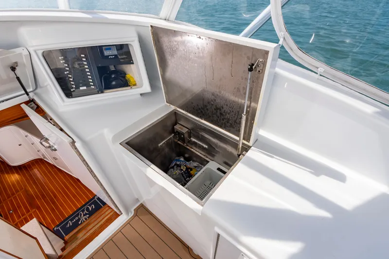 Slide: The Image of Open stainless steel compartment on a 1999 Custom Lohr 43 Express yacht. - 15