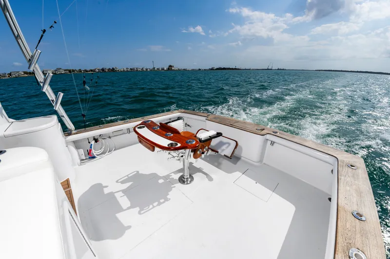 Slide: The Image of Aft view of Custom Lohr 43 Express yacht on open sea. - 18