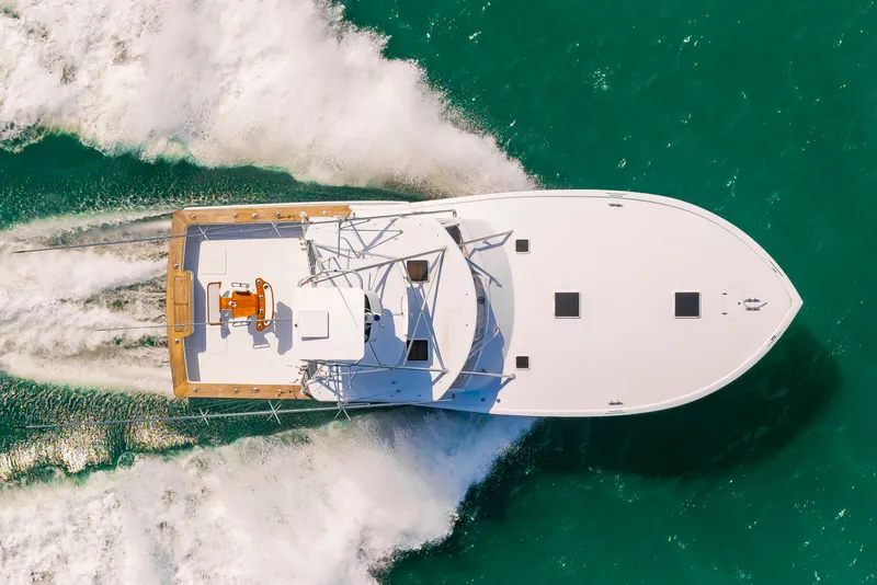 Slide: The Image of Aerial view of a 1999 Custom Lohr 43 Express yacht on the sea. - 2
