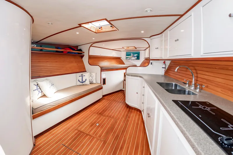 Slide: The Image of Interior of a 1999 Custom Lohr 43 Express yacht with wooden flooring. - 30