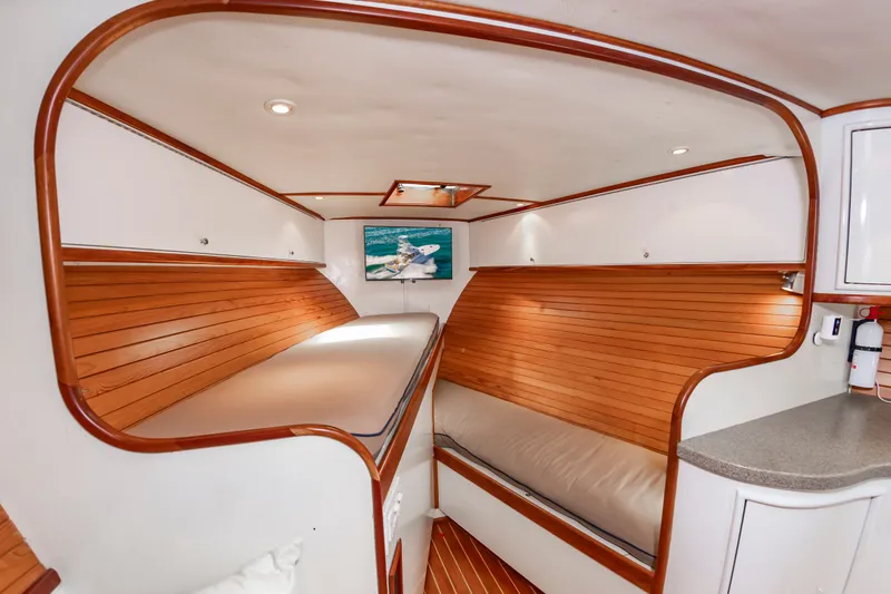 Slide: The Image of Interior of Custom Lohr 43 Express yacht, 1999, featuring wood paneling. - 35