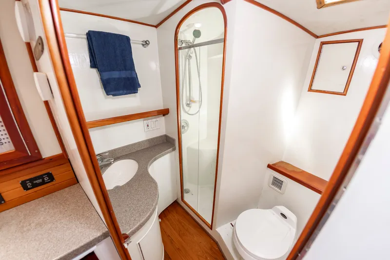 Slide: The Image of Interior view of 1999 Lohr 43 Express bathroom with shower. - 37