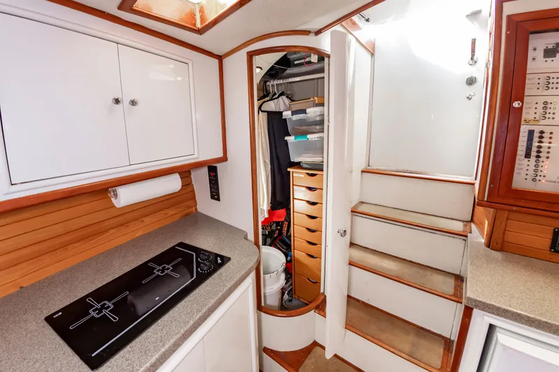Slide: The Image of Interior of Custom Lohr 43 Express yacht, kitchen and stairs, built in 1999. - 40