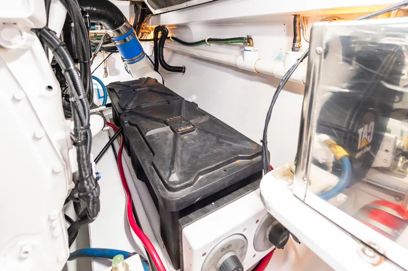 Slide: The Image of Engine room of 1999 Custom Lohr 43 Express with wiring and battery. - 48