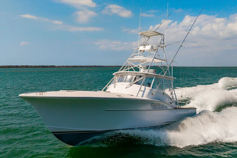 Slide: The Image of Custom Lohr 43 Express yacht from 1999 cruising on the sea. - 7