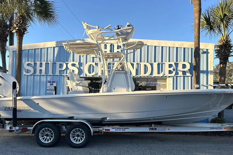Slide: The Image of 2026 Pathfinder 2600 TRS boat on trailer outside Ships Chandler building. - 30