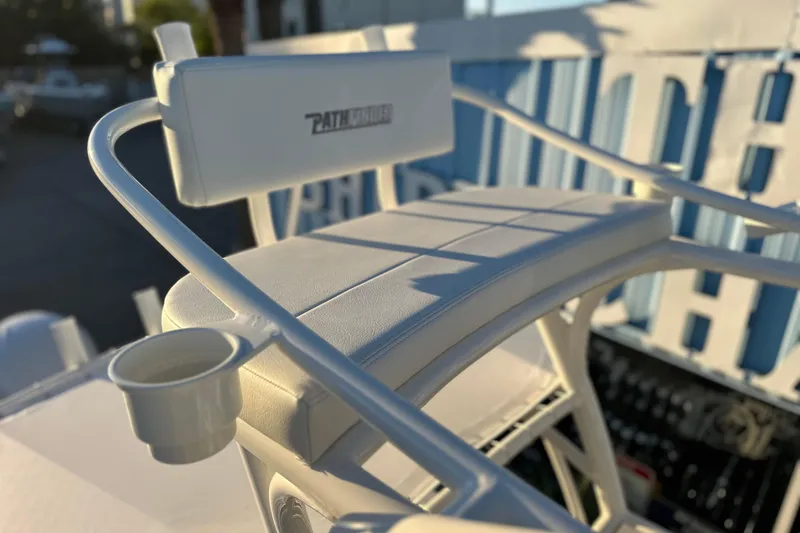 Slide: The Image of 2026 Pathfinder 2600 TRS boat seat with cup holder, featuring sleek white design. - 6