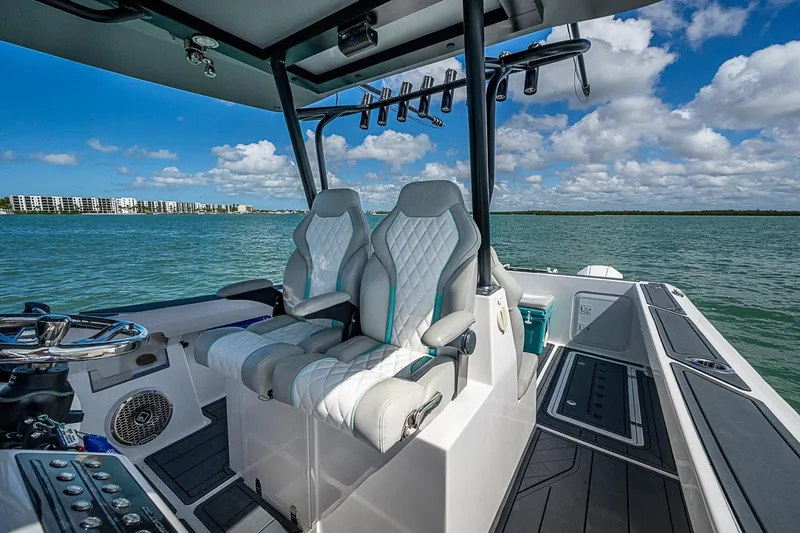 Slide: The Image of 2025 Hammer Yachts 30 interior with luxurious seating and ocean view. - 20