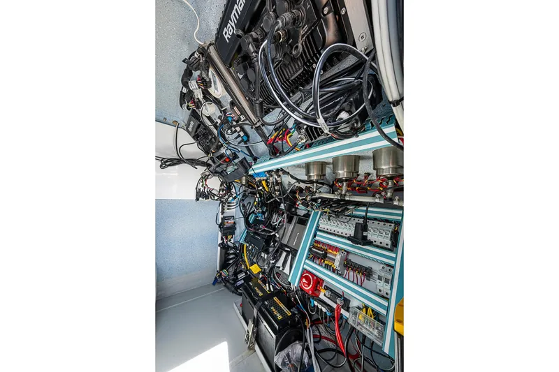 Slide: The Image of Electrical system of a 2025 Hammer Yachts 30, showcasing complex wiring and components. - 25