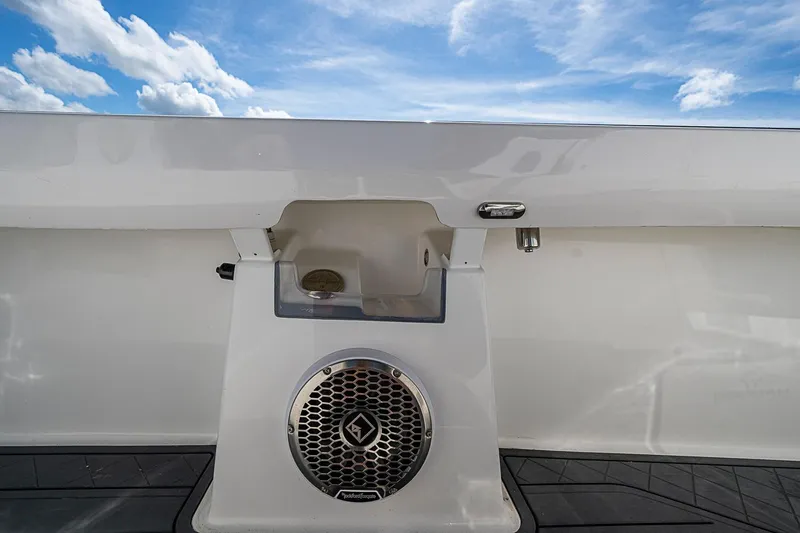Slide: The Image of 2025 Hammer Yachts 30 boat detail with speaker and blue sky background. - 27