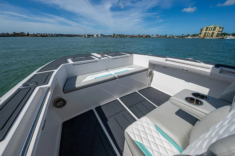 Slide: The Image of Luxurious interior of 2025 Hammer Yachts 30, featuring sleek seating and cup holders. - 28