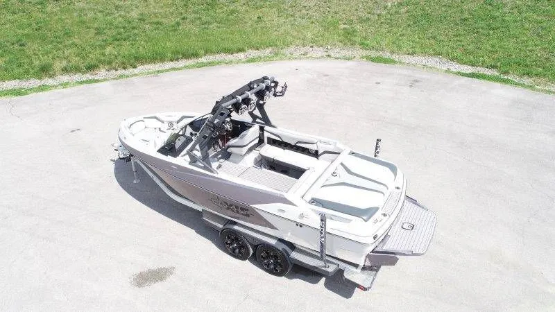 Slide: The Image of Aerial view of a 2017 Axis T23 boat on a trailer. - 10