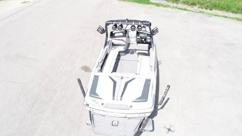 Slide: The Image of Aerial view of a 2017 Axis T23 boat on asphalt. - 11