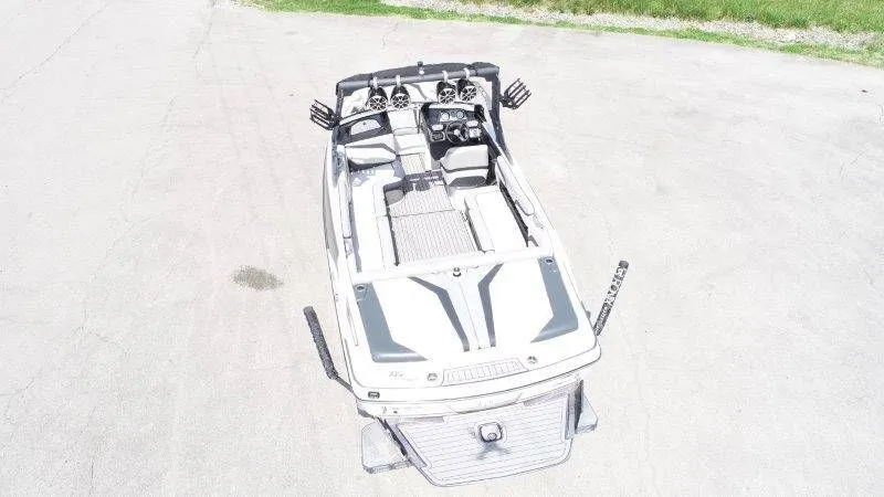 Slide: The Image of Aerial view of a 2017 Axis T23 boat on pavement. - 12