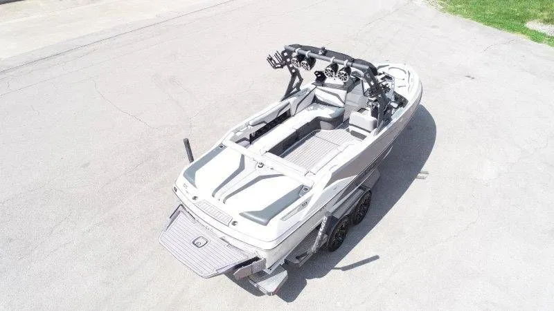 Slide: The Image of Aerial view of a 2017 Axis T23 boat on a trailer. - 14