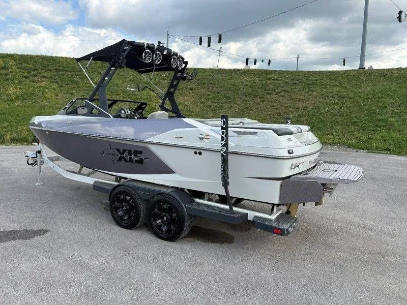 Slide: The Image of 2017 Axis T23 boat on trailer, side view. - 16
