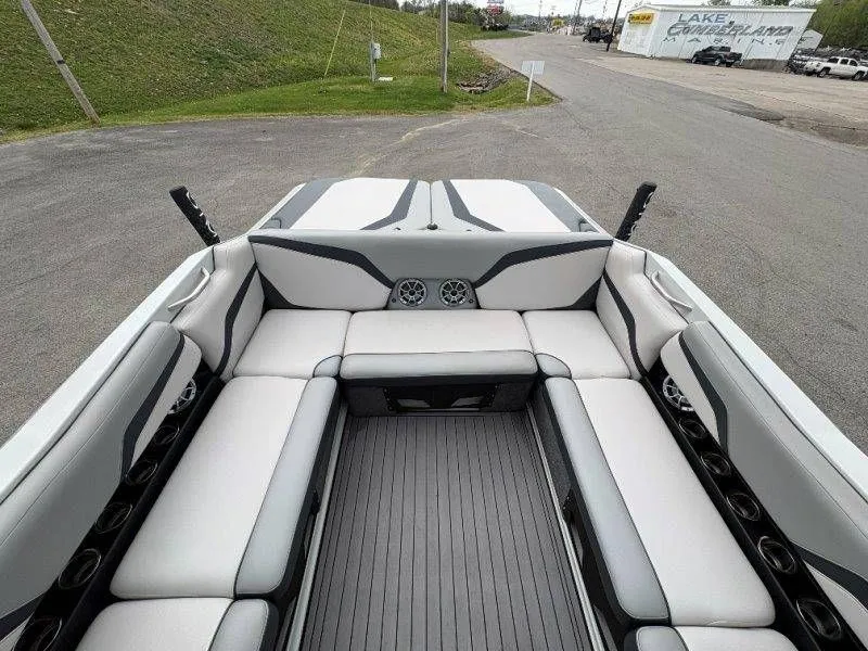 Slide: The Image of Interior of a 2017 Axis T23 boat with gray upholstery. - 24