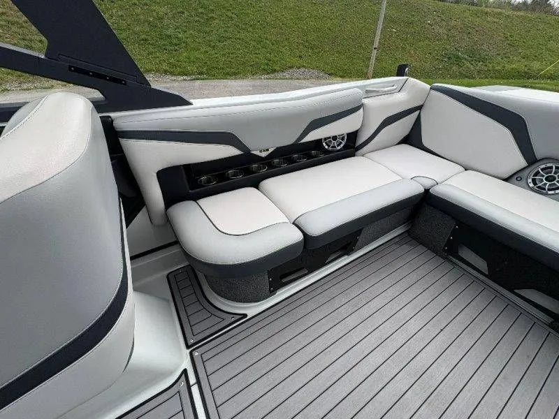 Slide: The Image of Interior of a 2017 Axis T23 boat with gray upholstery. - 25