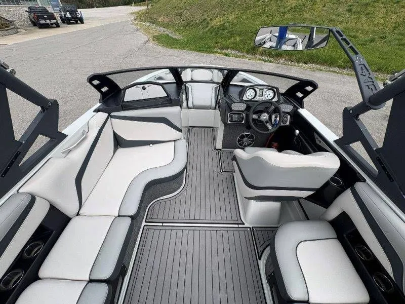 Slide: The Image of Interior of a 2017 Axis T23 boat with gray seating. - 30