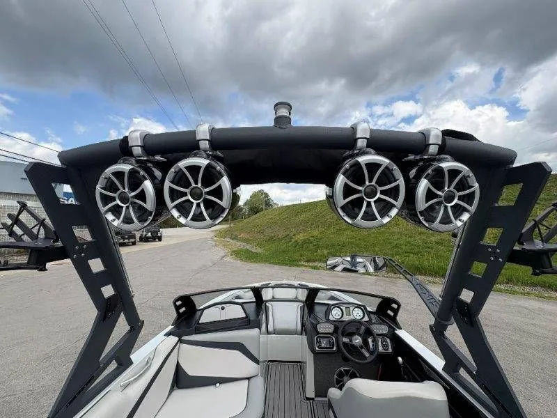 Slide: The Image of 2017 Axis T23 boat with speakers and control console. - 31