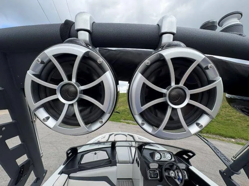 Slide: The Image of 2017 Axis T23 boat with speakers and cockpit view. - 32