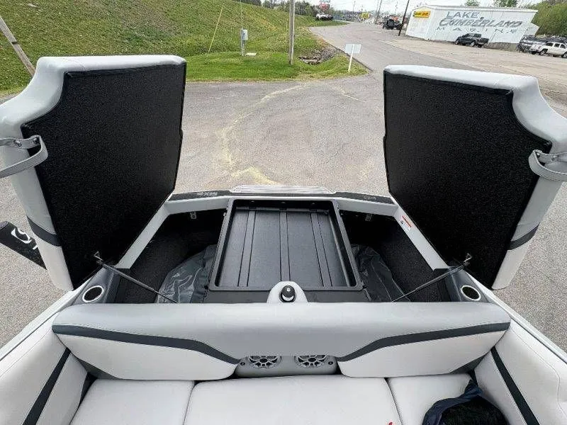 Slide: The Image of 2017 Axis T23 boat with open storage compartment. - 34