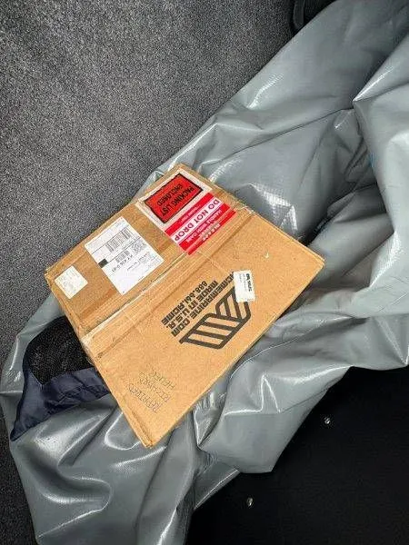 Slide: The Image of Cardboard box on gray fabric in Axis T23 boat, 2017. - 37