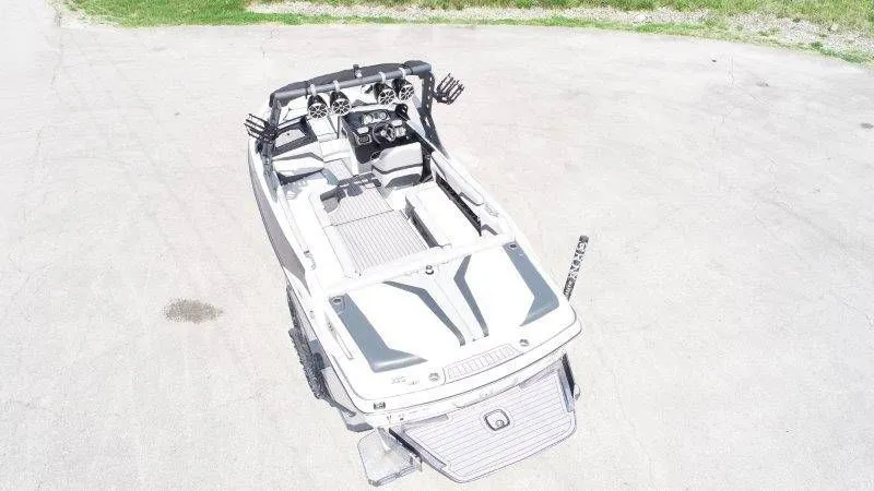 Slide: The Image of Aerial view of a 2017 Axis T23 boat on asphalt. - 4