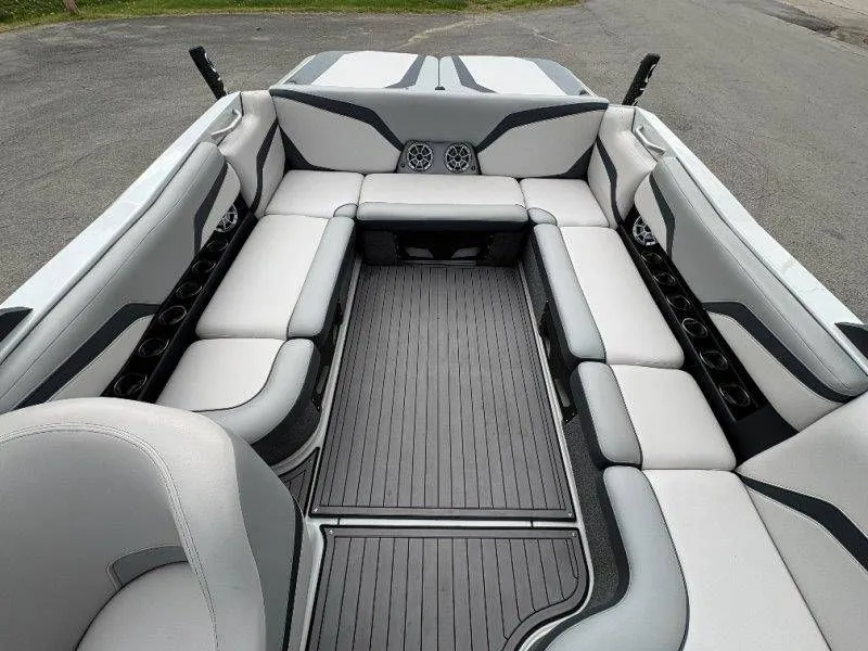 Slide: The Image of Interior of a 2017 Axis T23 boat with gray upholstery. - 48