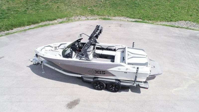 Slide: The Image of Aerial view of a 2017 Axis T23 boat on a trailer. - 5